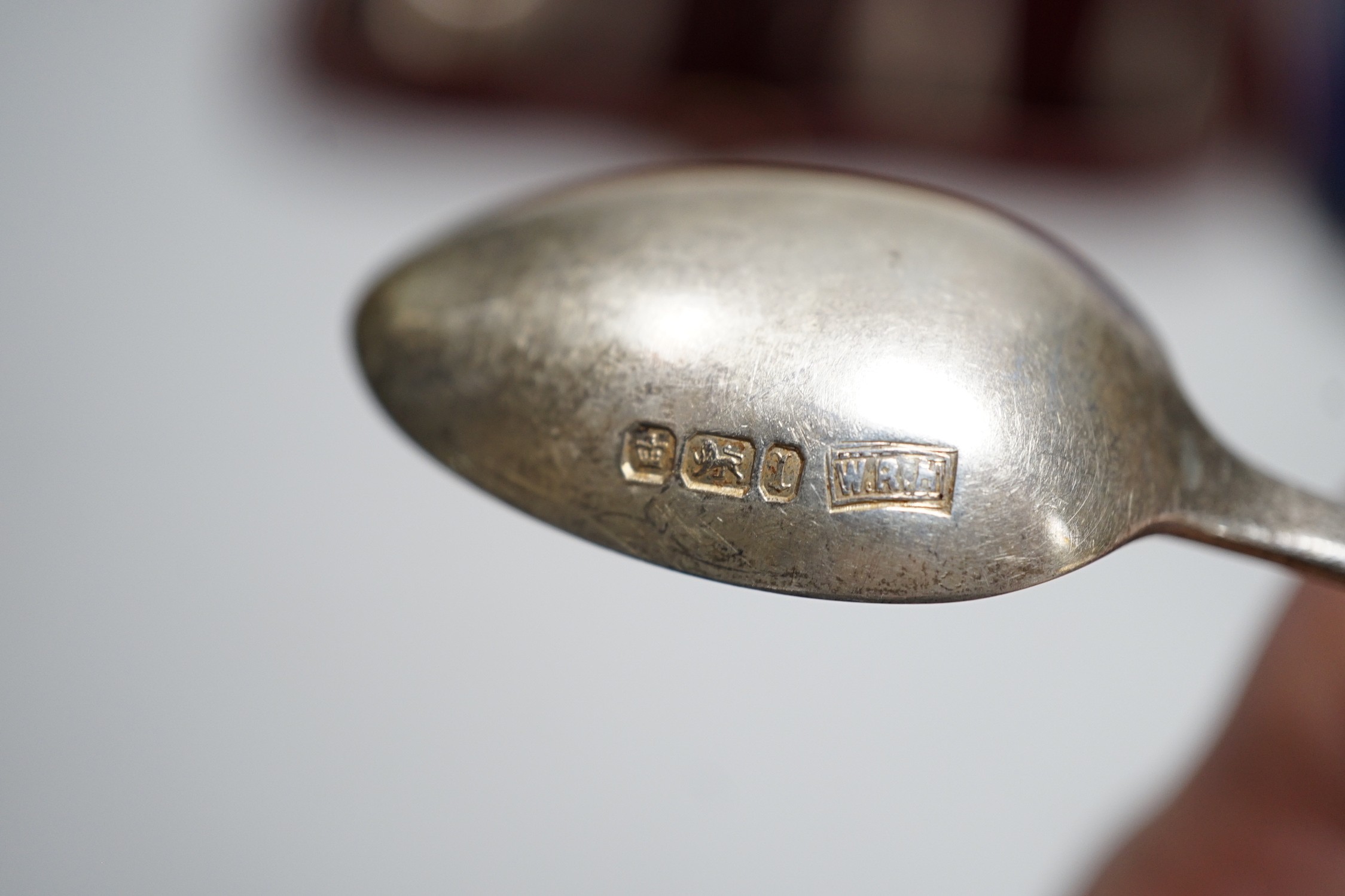 Two cased sets of six silver teaspoons and sugar tongs, including Sheffield, 1908.